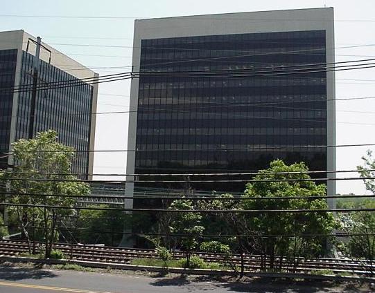 office building across the street and tracks